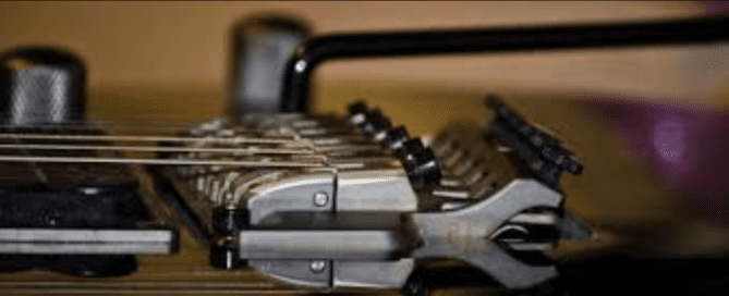 Precio ajustar guitarra electrica